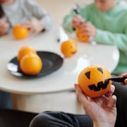 Children can paint oranges with faces to represent mini pumpkin Jack-O'-Lanterns Children can paint oranges with faces to represent mini pumpkin Jack-O'-Lanterns