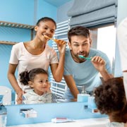 Children can learn about brushing teeth by following their parents' examples. Children can learn about brushing teeth by following their parents' examples.